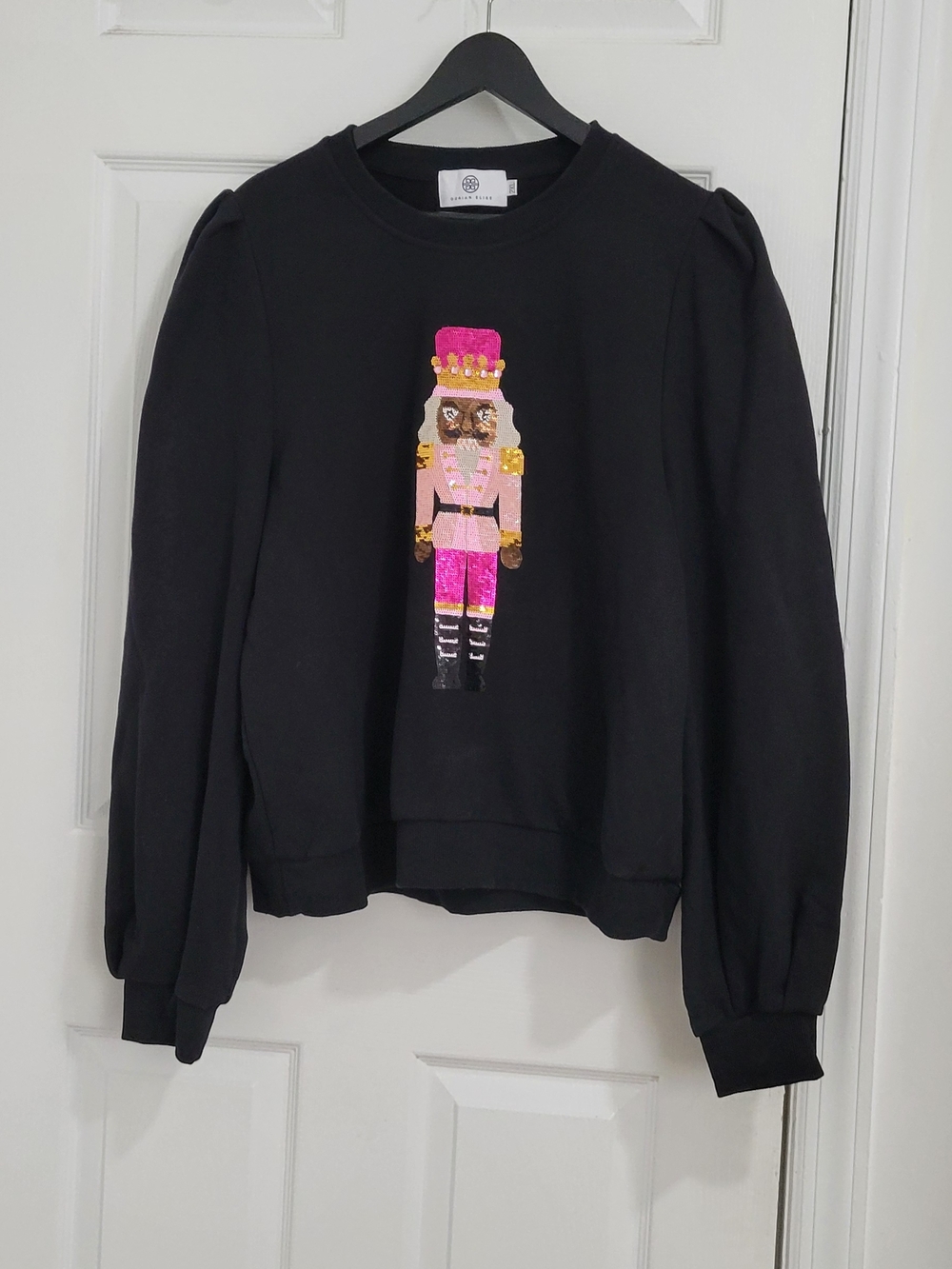 Dorian Elise Black Sweatshirt with Pink Sequin Nutcracker Motif